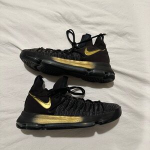 Nike Black and Gold Sneakers